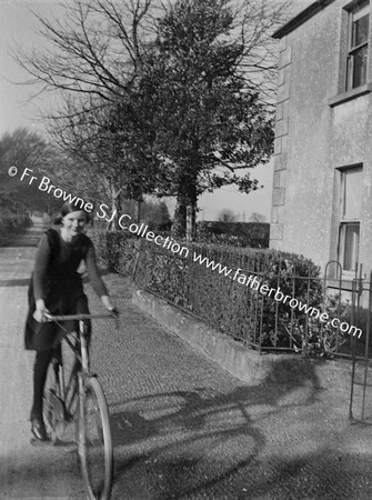 SHEILA COBBE WITH FR.BROWNE'S BIKE